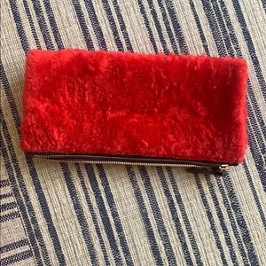 Clare V. Shearling clutch